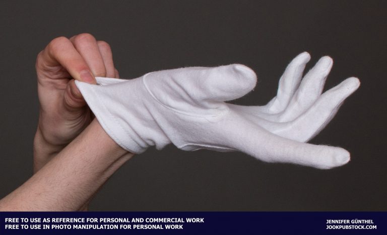 a hand wearing a glove