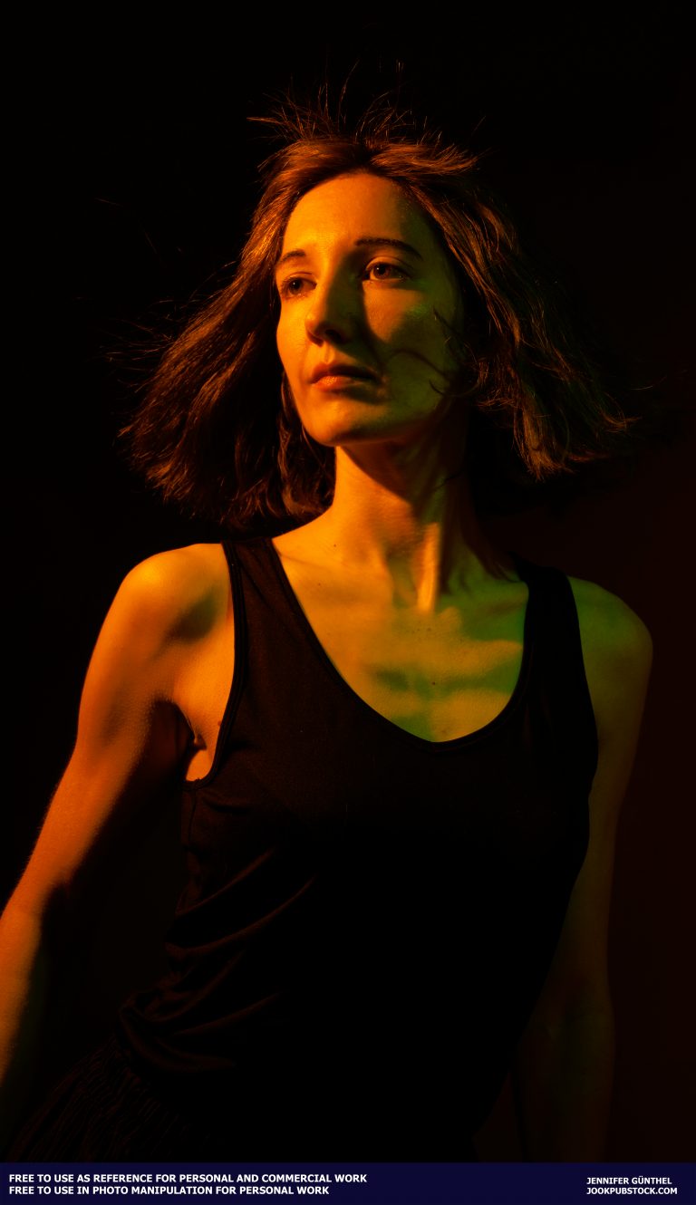 a portrait photo of a person wearing a black tanktop