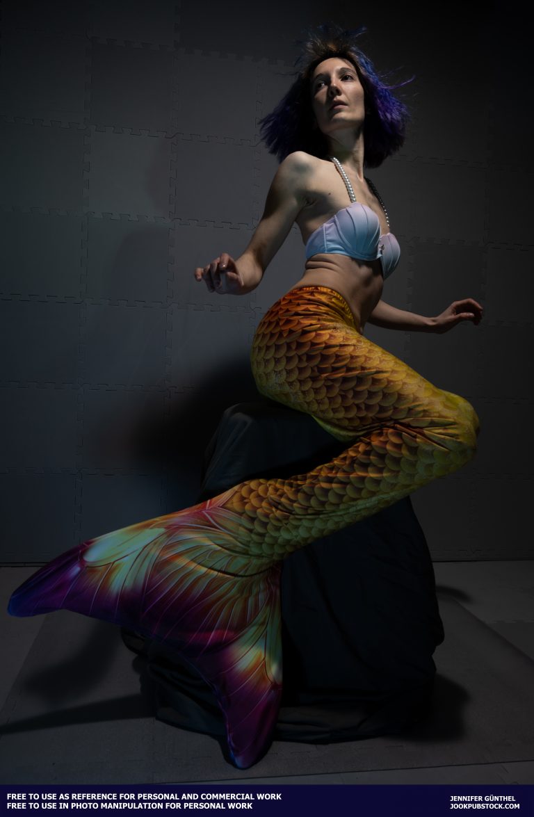 a person wearing a mermaid costume