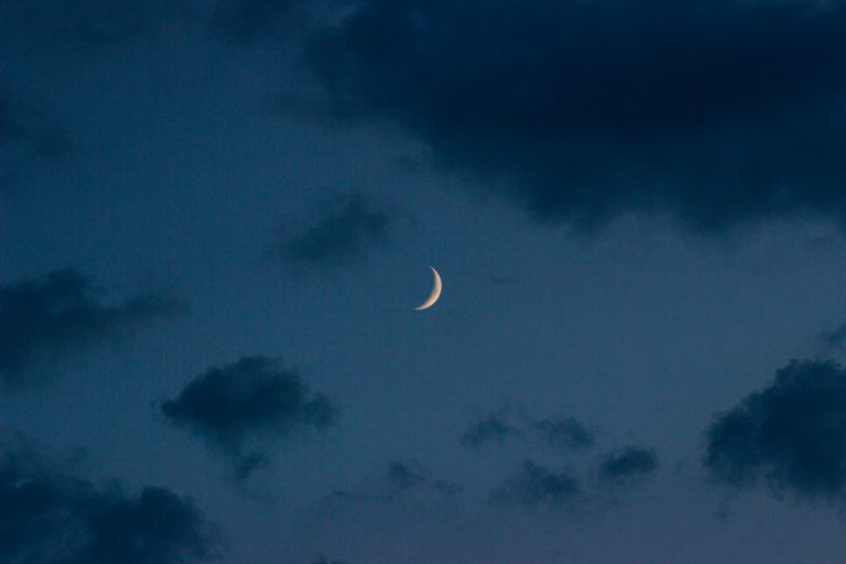 a photo of the moon and clouds