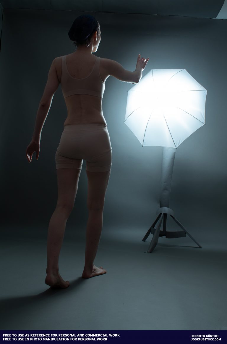 a person standing in front of a bright light