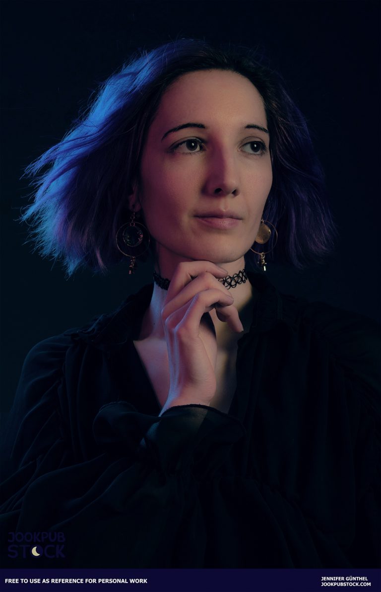 a portrait photo of a person with blue hair