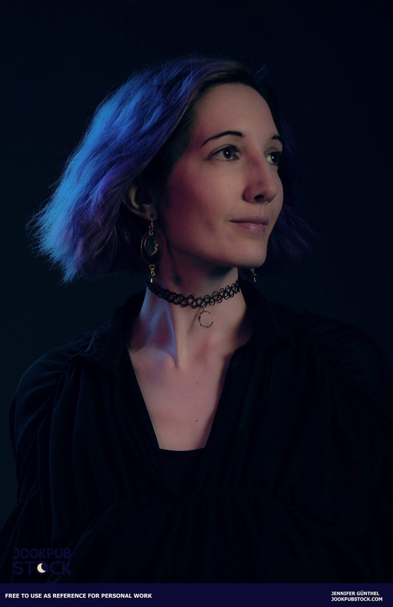 a portrait photo of a person with blue hair