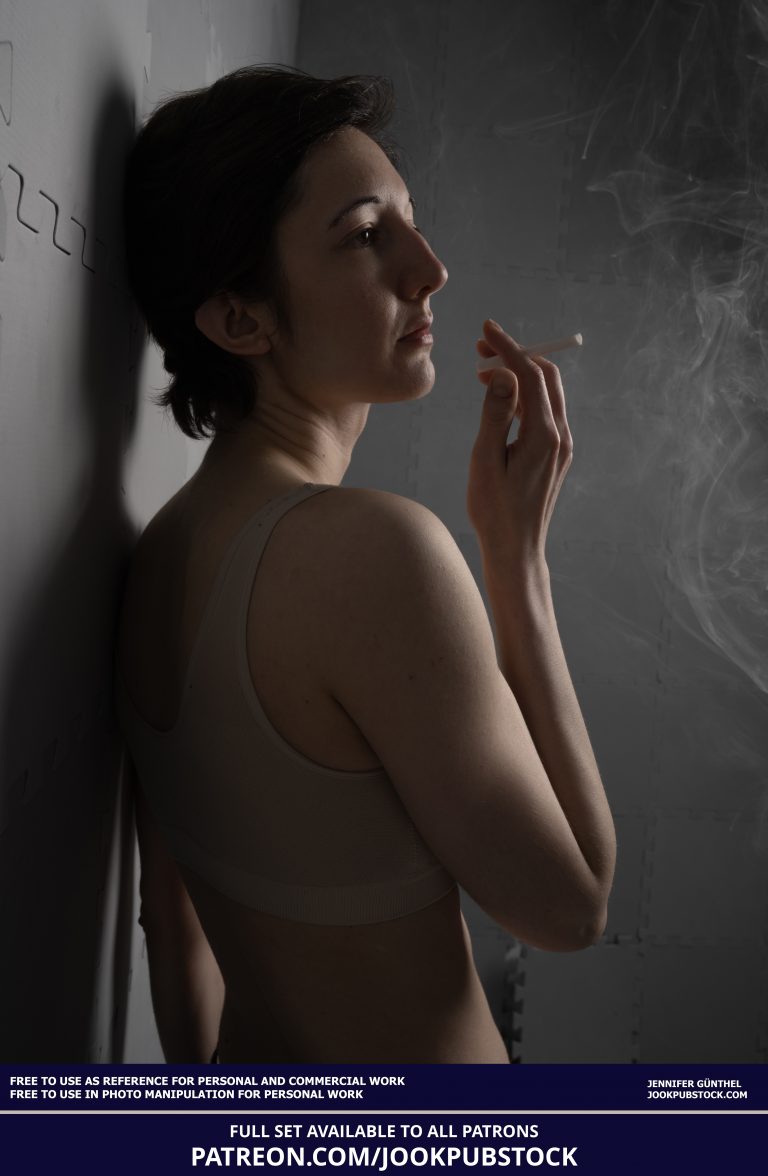 drawing reference photo of a model wearing form fitting underwear, holding a cigarette