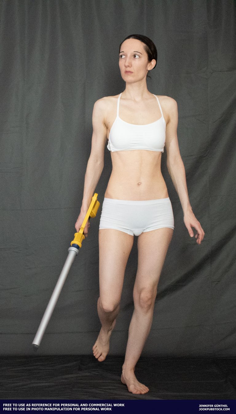 a person wearing form fitting underwear, holding a keyblade