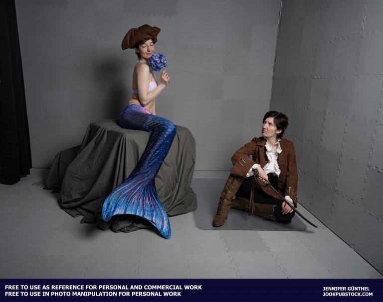 drawing reference photos of a model wearing a mermaid costume and a pirate costume