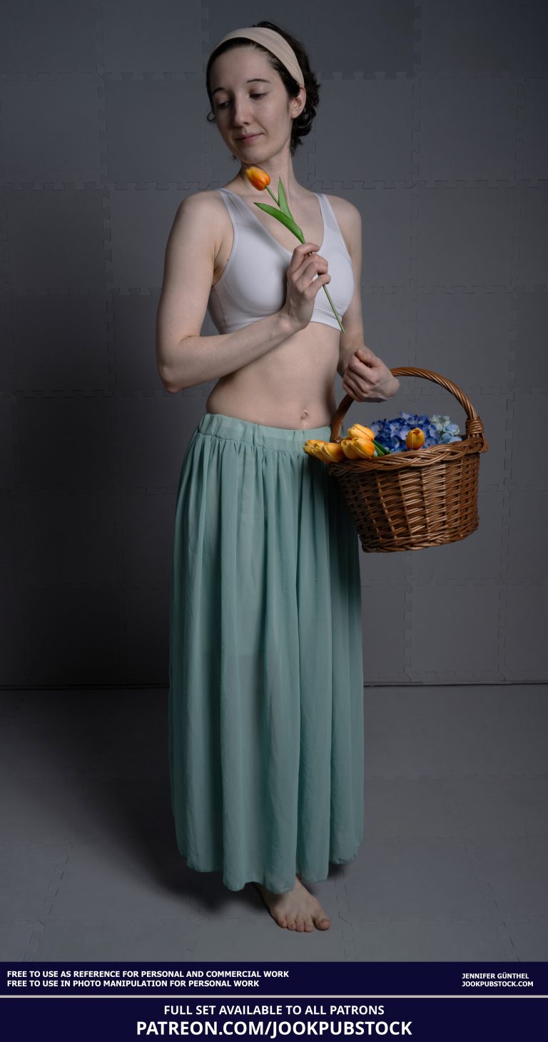 drawing reference photo of a model wearing form fitting underwear, holding a basket and flowers